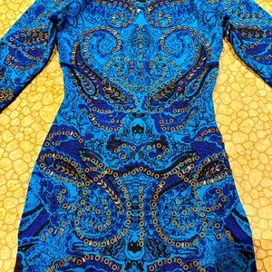 Bandage dress with metal rings